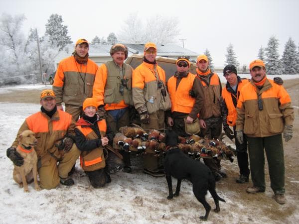 Group of hunters in orange gear